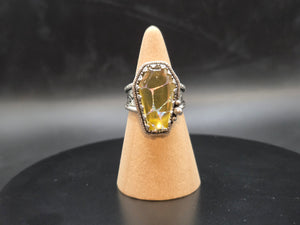 Metallic Gold With A Rainbow Inlay Topped With A Clear Quartz